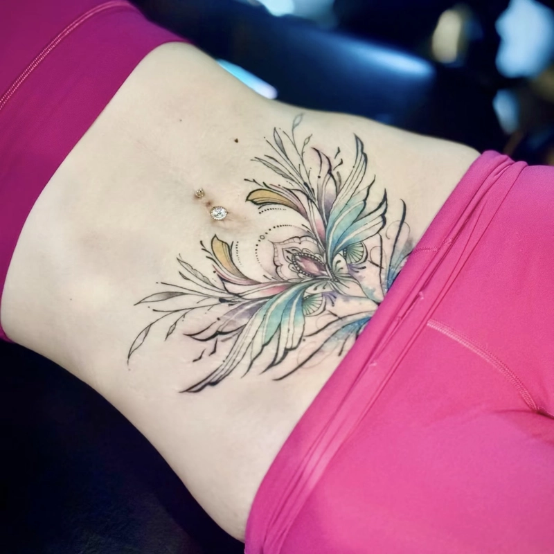 Gợi ý tattoo vùng bụng nữ phong cách quyến rũ