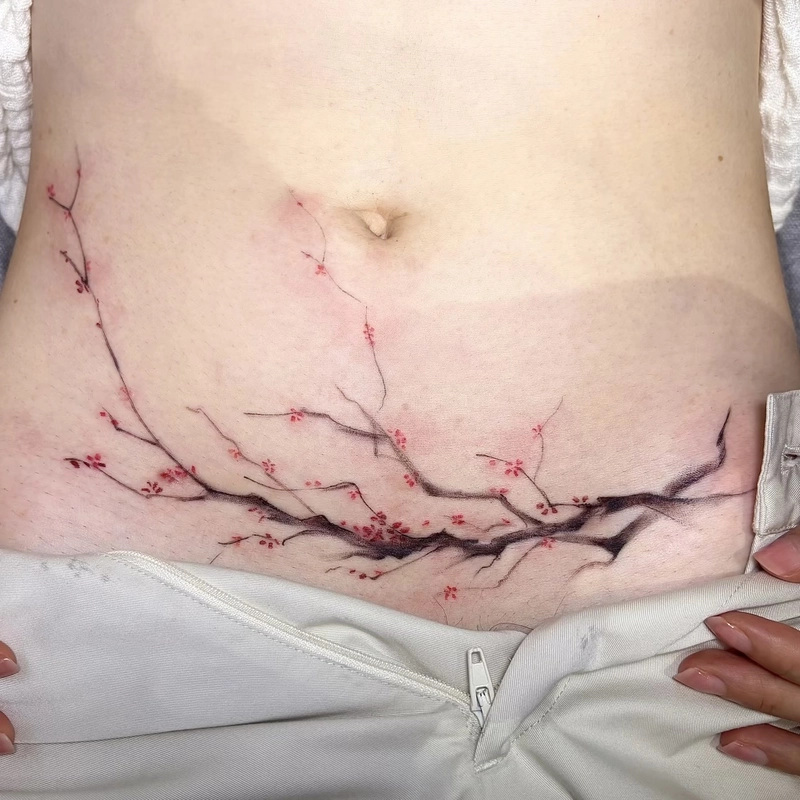 Hình xăm bụng nữ nghệ thuật giúp thể hiện cá tính