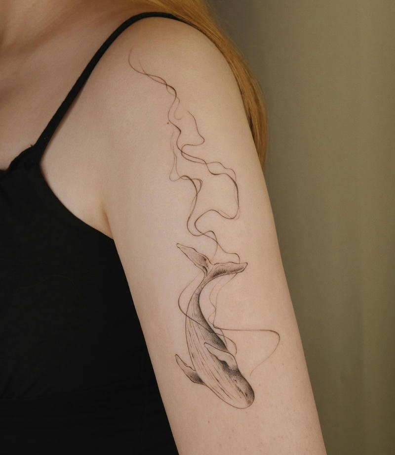 Hình xăm cá voi kết hợp sóng nước huyền ảo