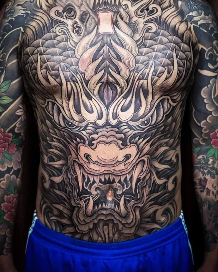 Tattoo đầu rồng full bụng với thiết kế hài hòa