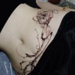 hình xăm bụng nữ thumbnail