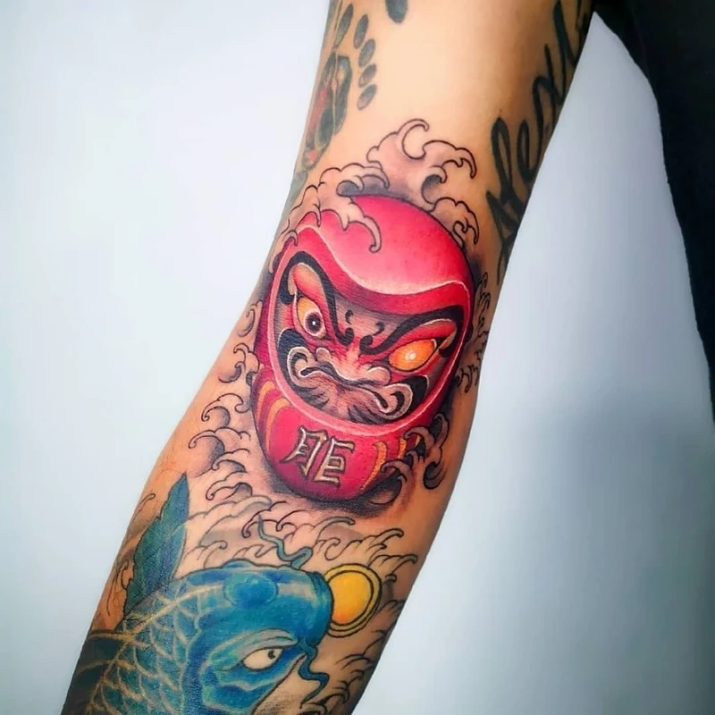 Ảnh xăm nhật cổ với daruma thể hiện tinh thần bền bỉ