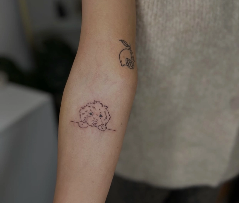 Hình tattoo con chó nhỏ ở tay