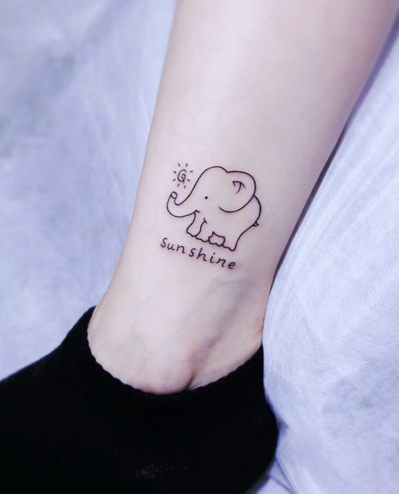Hình tattoo con voi phối với chữ