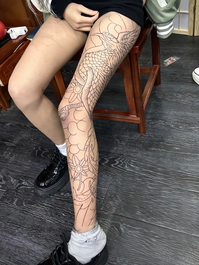 Hình xăm phượng hoàng kín chân tạo hình sống động nổi bật