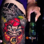 Mẫu xăm daruma nửa tay với bố cục cân đối đẹp mắt