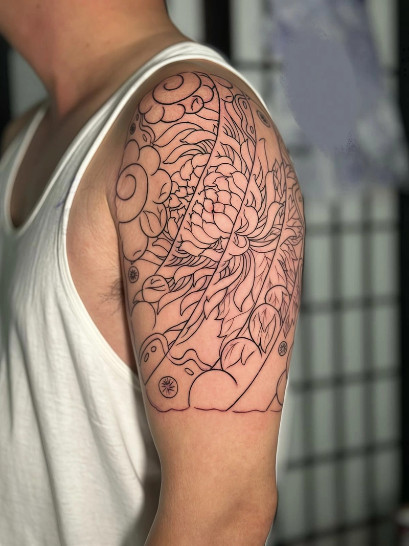Tattoo bắp tay nam họa tiết nghệ thuật đầy ấn tượng
