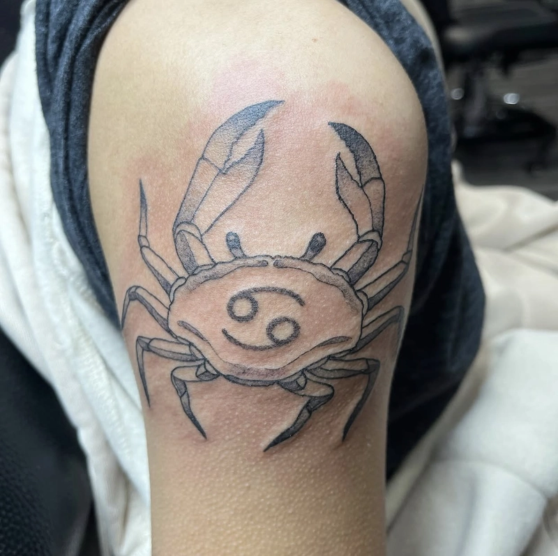 Tattoo con cua cung cự giải đẹp
