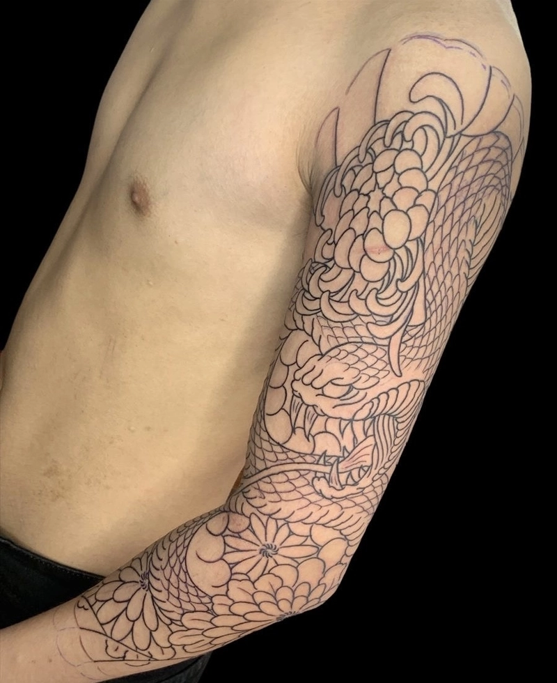 Tattoo hoa văn nam bắp tay phong cách độc đáo mạnh mẽ