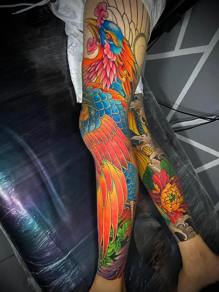 Tattoo phượng hoàng phủ chân với thiết kế hài hòa