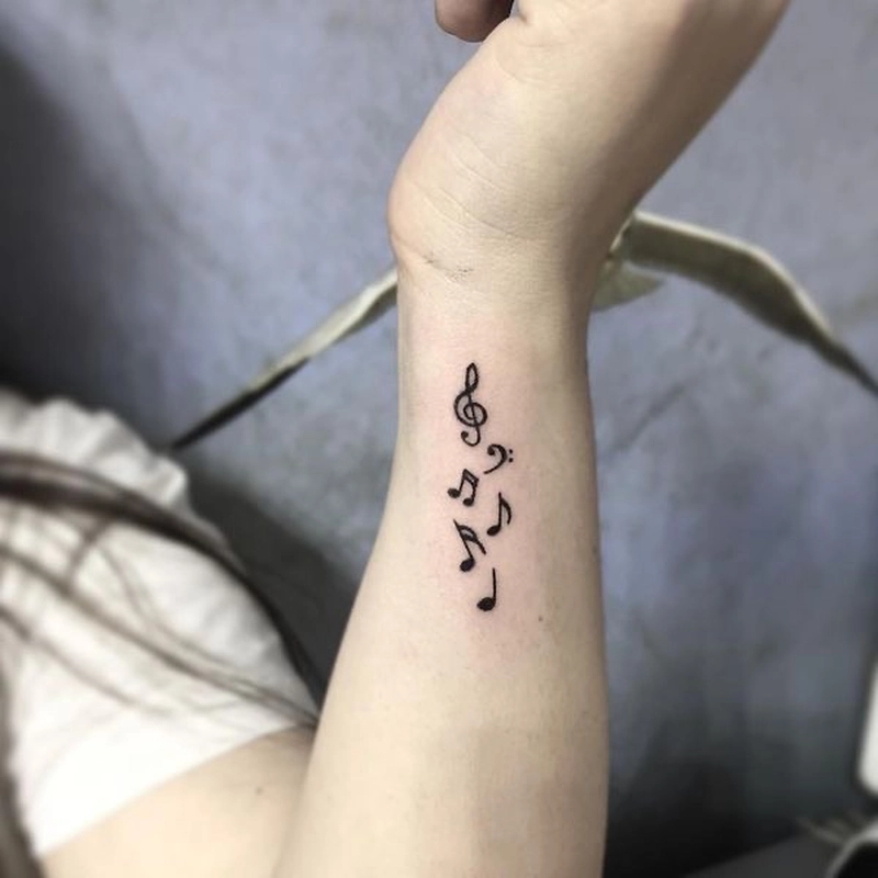 mẫu hình xăm nốt nhạc vui tươi