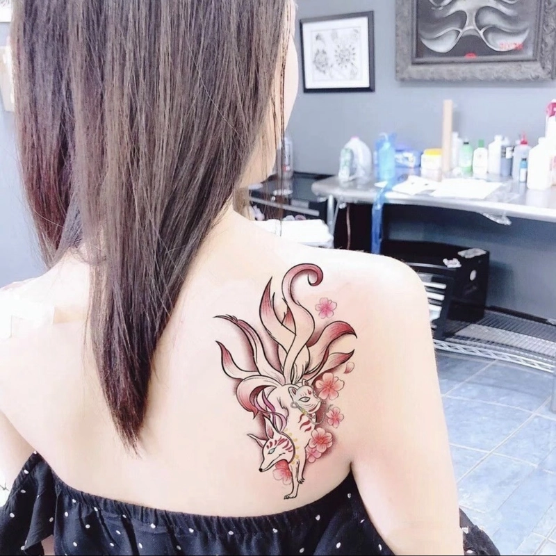 Ảnh hình xăm hồ ly 9 đuôi cho nữ với tạo hình hồ ly