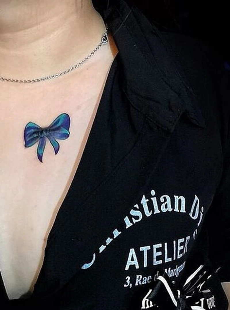 Hình xăm nơ mini hợp tattoo tay nữ phong cách nhẹ nhàng
