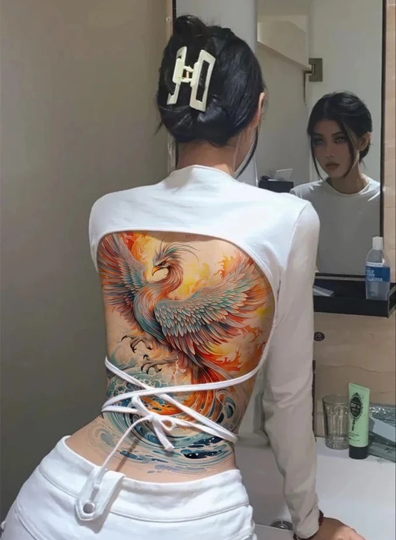 Kiểu hình xăm phượng hoàng lửa cho nữ đơn giản