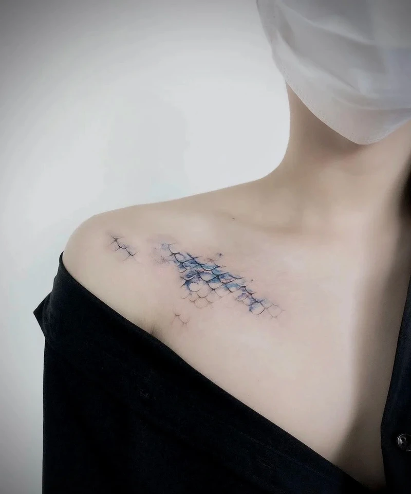 hình xăm vảy rồng ấn tượng dành cho người yêu tattoo
